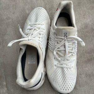 On cloud white tennis shoes